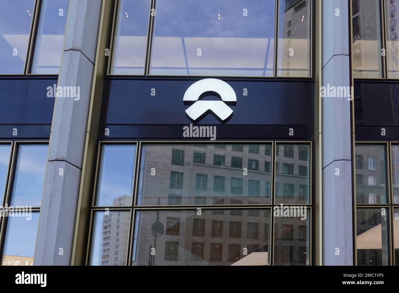 Logo over the salesroom of the company NIO, Chinese start-up for electric cars based in Shanghai, Berlin, Germany Stock Photo