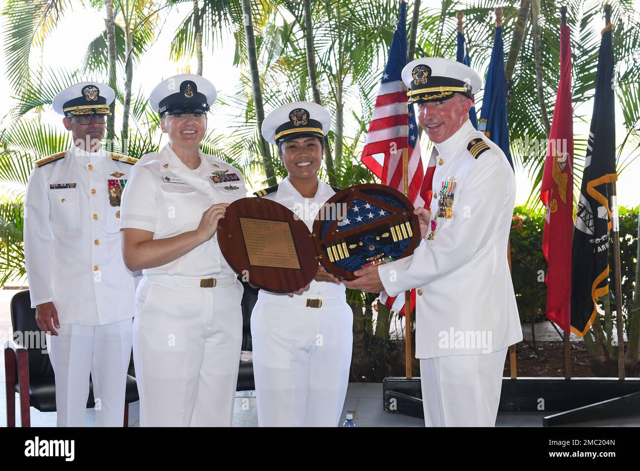 Lt. Sarah Alferos and Senior Chief Petty Officer Mindy Sweeney present ...