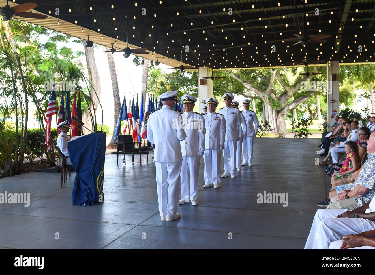 officers club dress code Capt. Benjamin Lee passes Capt. Christopher Tepera the American flag during  the Old Glory presentation at Navy Medicine Readiness and Training Command  Pearl Harbor (NMRTC-PH) Change of Command and Retirement Ceremony on