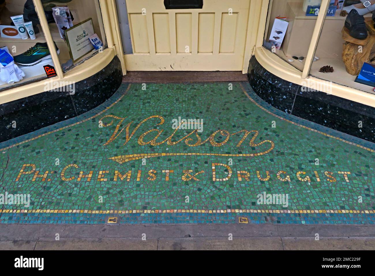 Entrance and mosaic to Watson, Ph Chemist & Druggist, pharmacy, now Foot Solutions, 61 South Great George's Street, Dublin, D02 VR83, Eire, Ireland Stock Photo