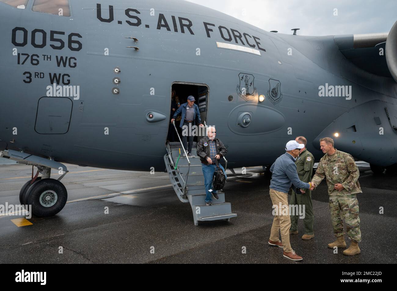 Department of the Air Force civic leaders depart a C-17 Globemaster III assigned to the 517th Airlift Squadron following a flight to Eielson Air Force Base, Alaska, during the DAF civic leader tour at Eielson AFB, June 23, 2022. The group of civic leaders visited Alaska to learn about PACAF, the 11th Air Force, and the strategic importance of installations operating in the arctic, as well as the unique set of challenges faced by units in Alaska. Stock Photo