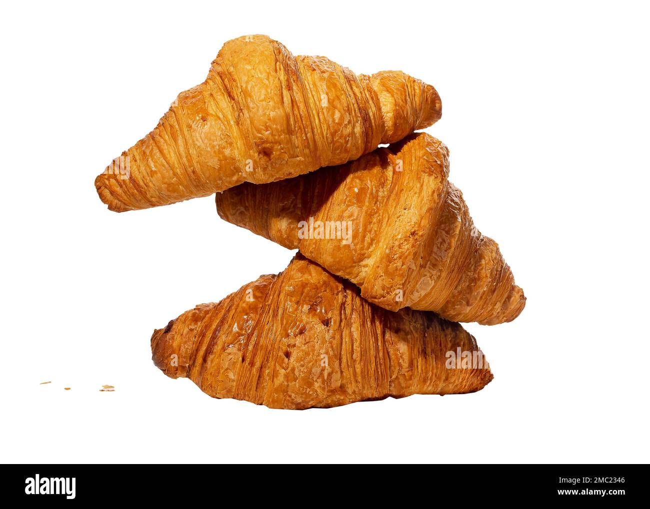 Fresh croissants stack, French bakery composition isolated on white background. High quality