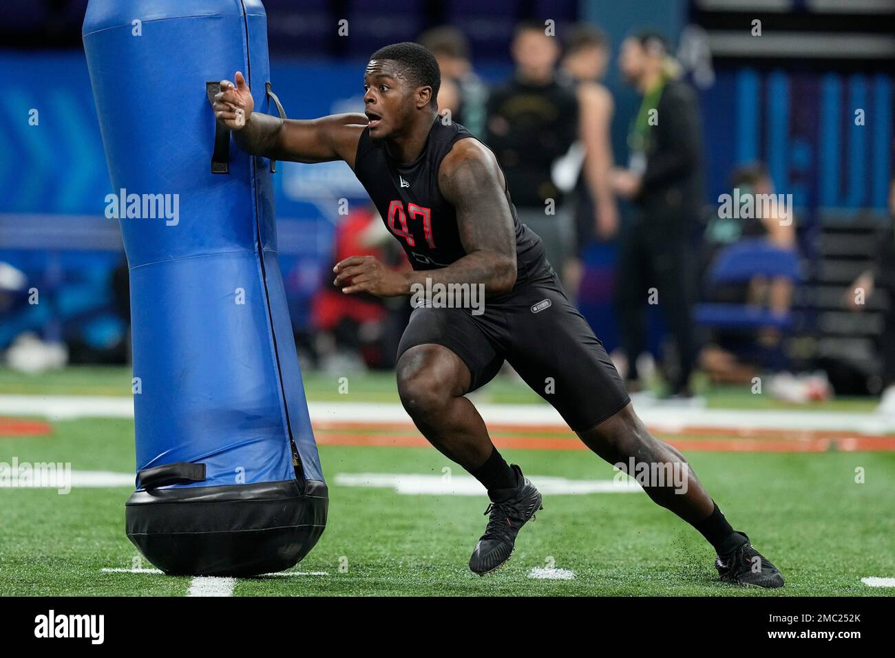 Oklahoma defensive lineman Nik Bonitto runs a drill during the NFL football  scouting combine, Saturday, March 5, 2022, in Indianapolis. (AP  Photo/Darron Cummings Stock Photo - Alamy