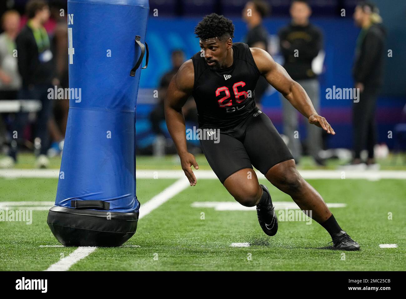 Thomas Booker #DL26 of Stanford runs a drill during the NFL Combine News  Photo - Getty Images