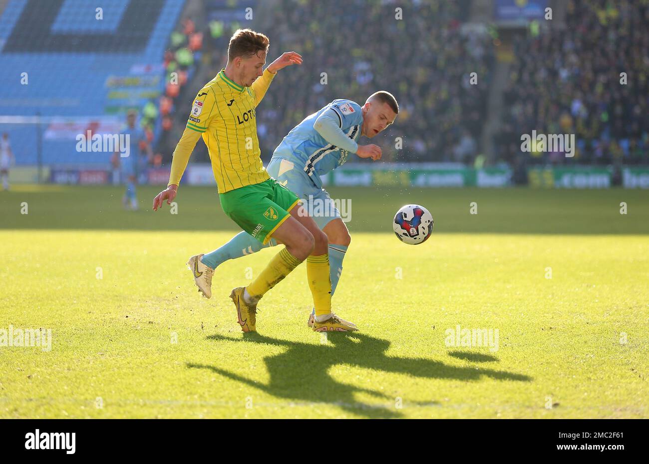 Coventry City's Jake Bidwell (right) and Norwich City's Kieran Dowell battle for the ball during the Sky Bet Championship match at the Coventry Building Society Arena, Coventry. Picture date: Saturday January 21, 2023. Stock Photo