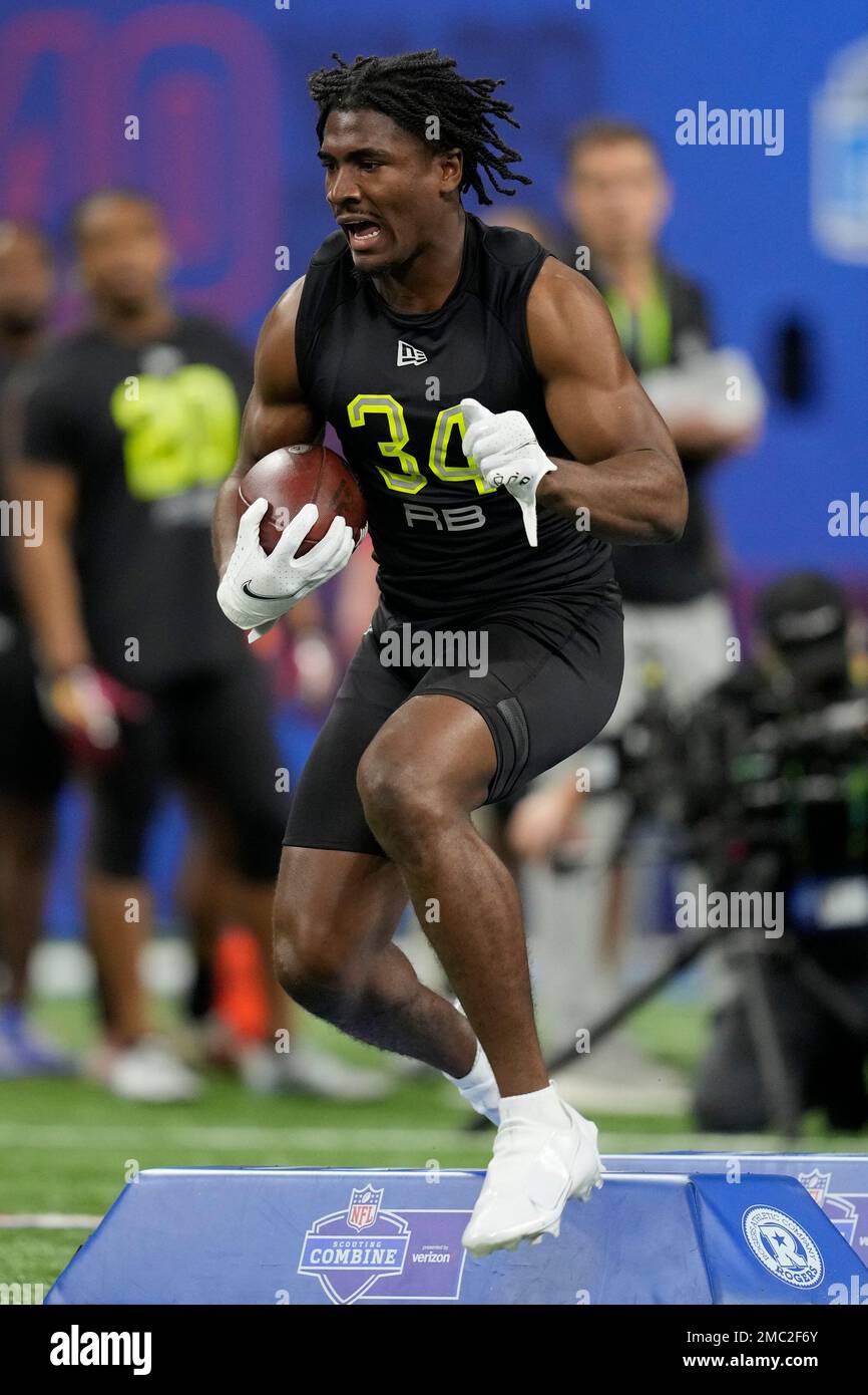 Arizona State running back Rachaad White participates in a drill at the