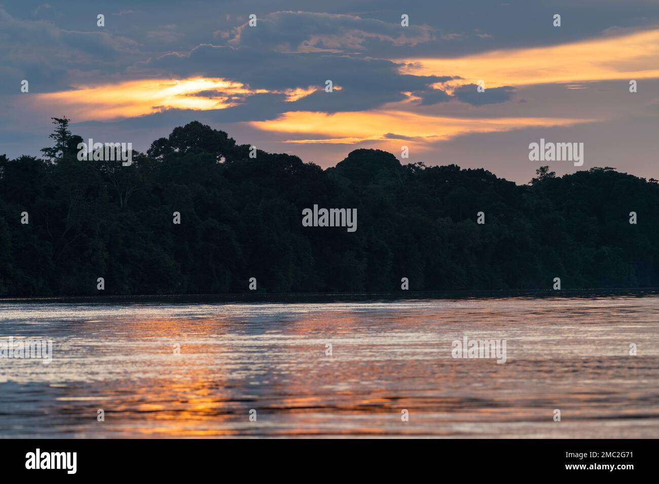 Sunset over the Kinabatangan River, Borneo, Malaysia Stock Photo