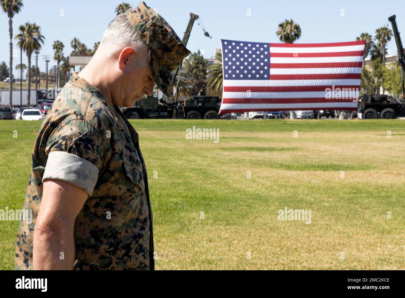 U.S. Marine Maj. Christopher B. Mulkey, the commander of troops of 1st Network Battalion, Marine Corps Cyberspace Operations Group, bows his head during a change of command ceremony on Marine Corps Base Camp Pendleton, California, June 24, 2022. 1st Network Bn. improves oversight, command, and control of the Marine Corps enterprise network while managing local area networks in the west coast region. Stock Photo