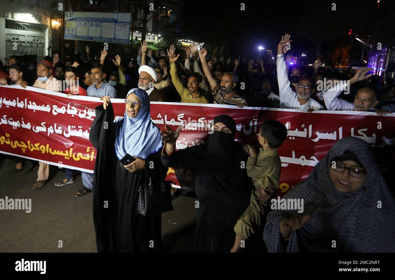 Shiite Muslims chant slogans during a demonstration to condemn the bomb ...