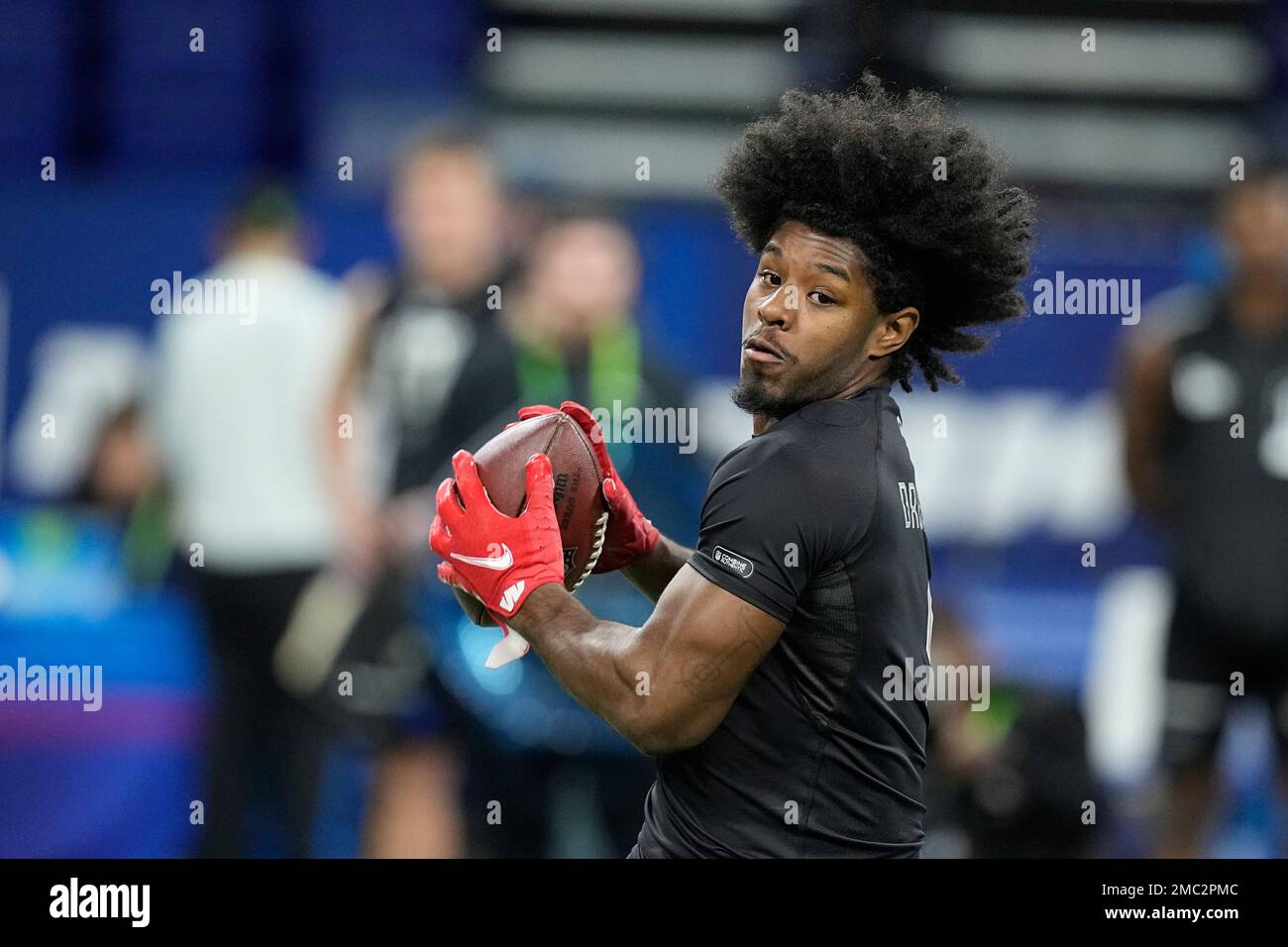 Mississippi wide receiver Dontario Drummond runs a drill during