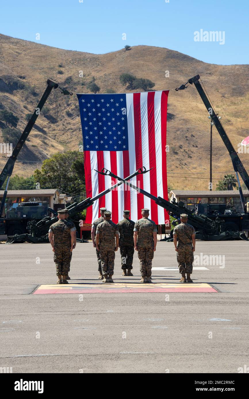 U.S. Marines with 1st Battalion, 11th Marine Regiment (1/11), 1st Marine Division, stand in formation during a change of command ceremony at Marine Corps Base Camp Pendleton, California, June 24, 2022. During the ceremony, Lt. Col. Matthew T. Ritchie relinquished command of 1/11 to Lt. Col. David J. Palka. Stock Photo