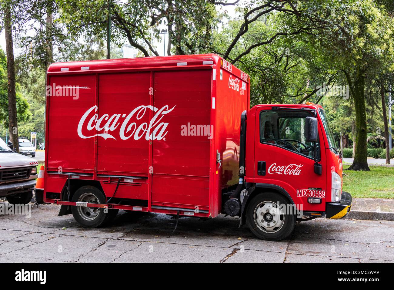 Red delivery Coca-Cola truck with logo, Mexico City, Mexico, North America, America Stock Photo