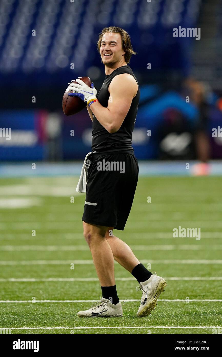 Pittsburgh quarterback Kenny Pickett (11) warms up at the NFL football scouting combine in