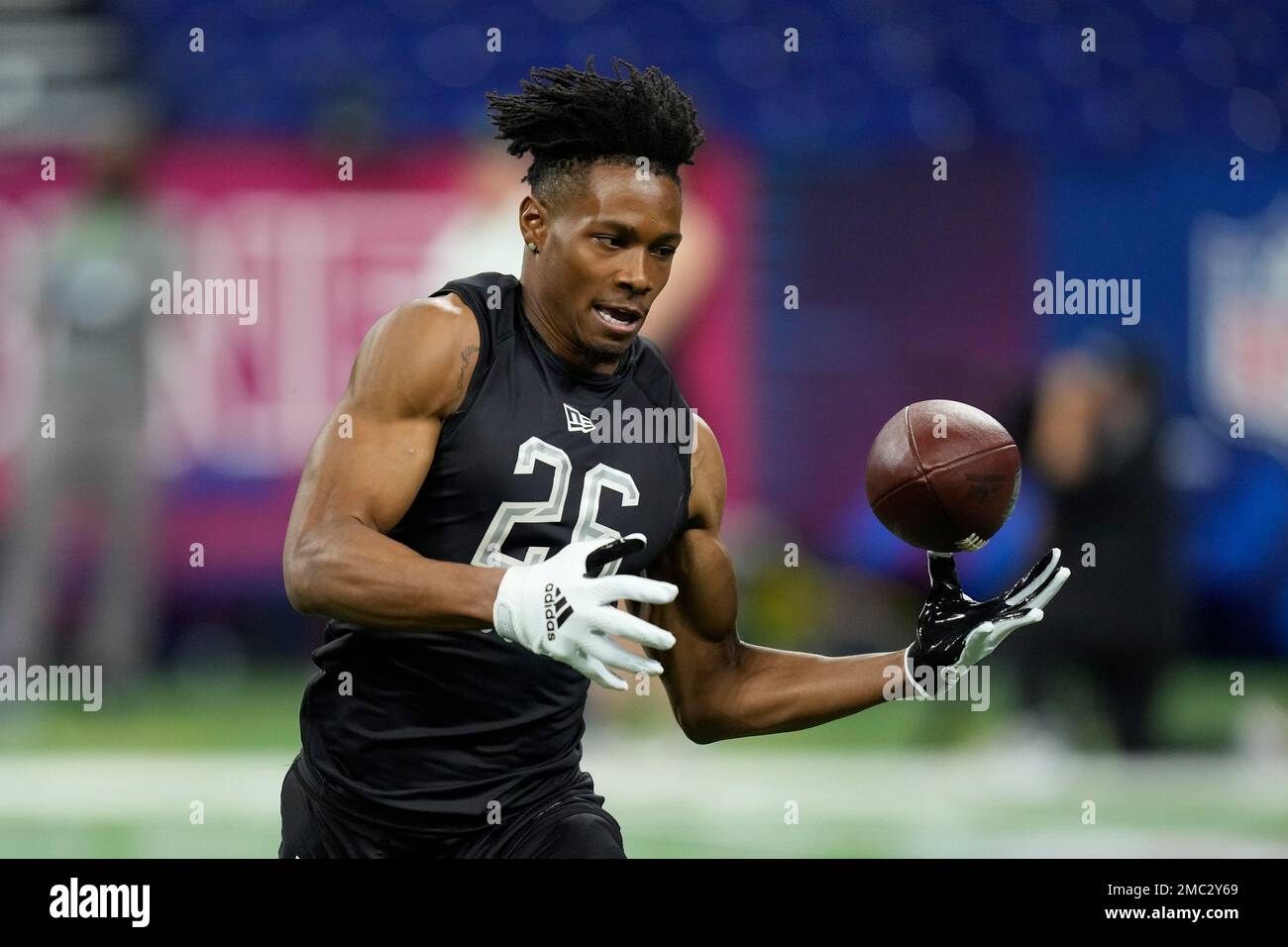 Miami wide receiver Charleston Rambo catches a pass during a drill at ...