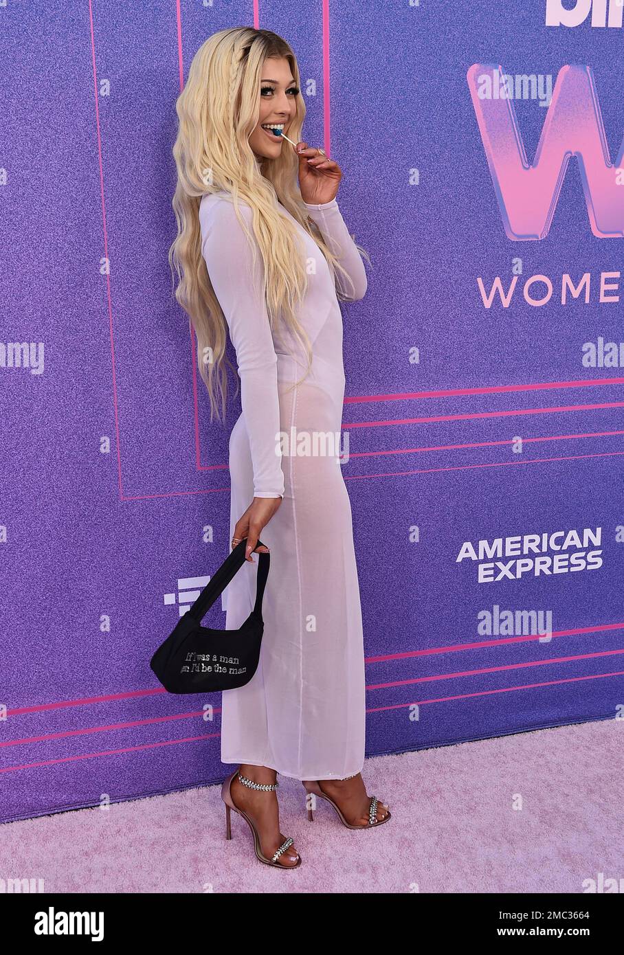 loren gray purple dress Loren Gray arrives at the Billboard Women in Music Awards on Wednesday,  March 2, 2022, at the YouTube Theater in Los Angeles. (Photo by Jordan  Strauss/Invision/AP Stock Photo