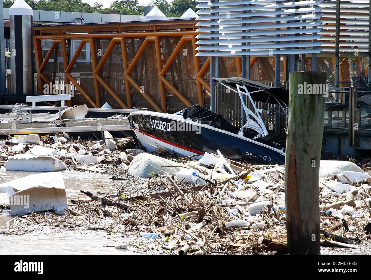 Wreckage are seen at the Hawthorne ferry terminal on the Brisbane river