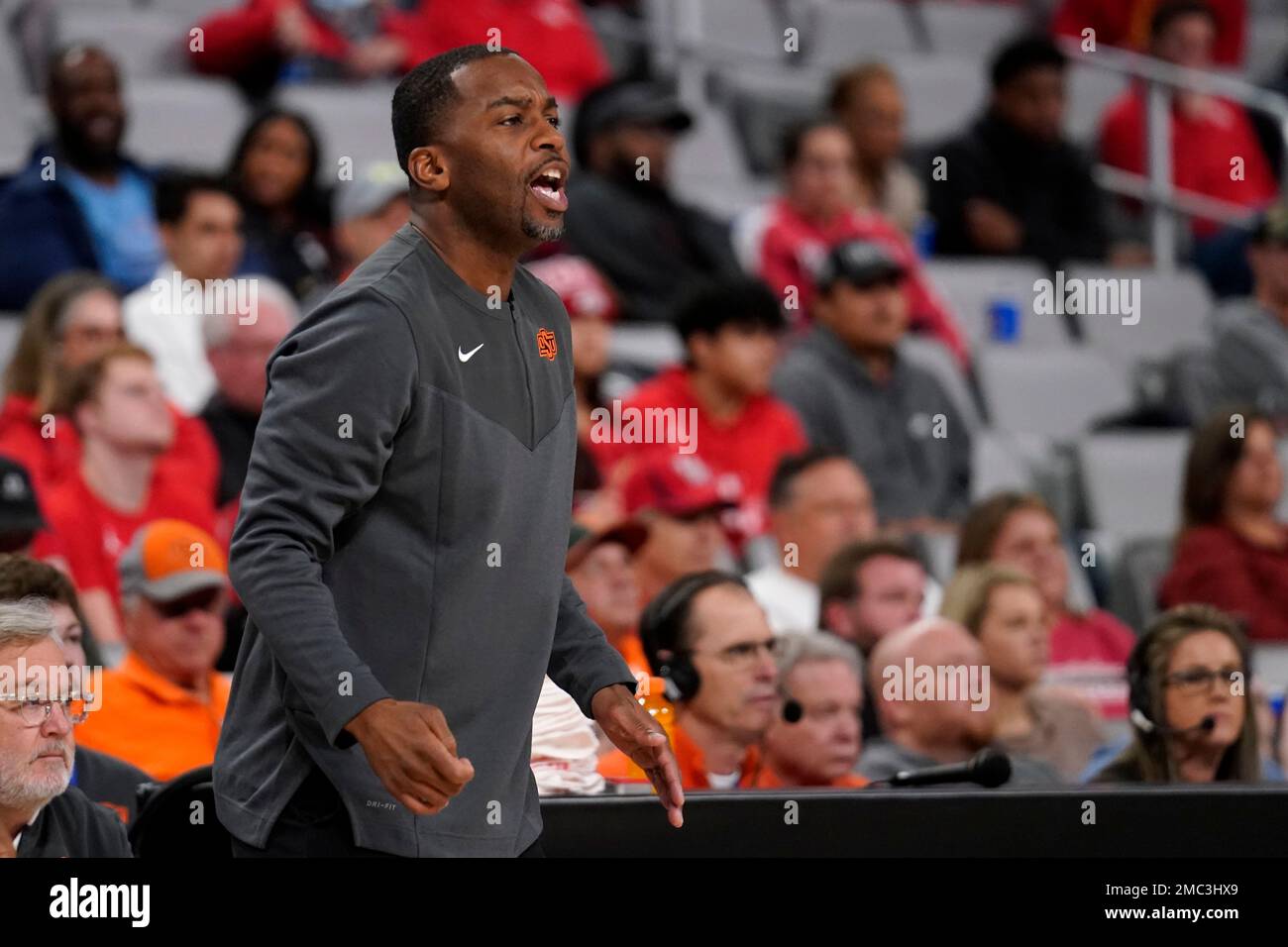 Oklahoma State head coach Mike Boynton Jr. instructs his team during an
