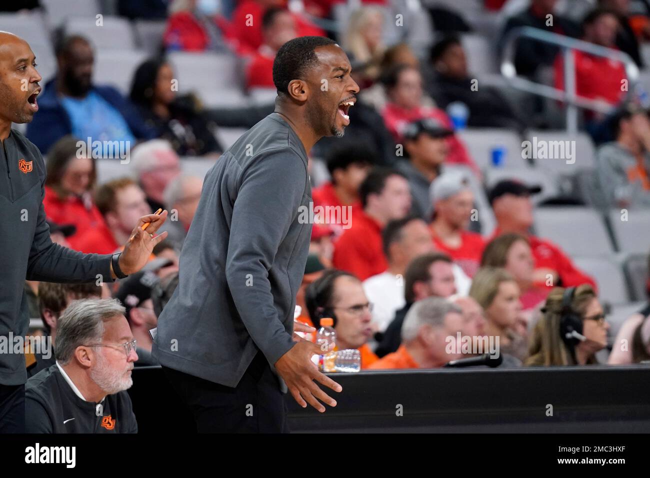 Oklahoma State head coach Mike Boynton Jr. instructs his team during an
