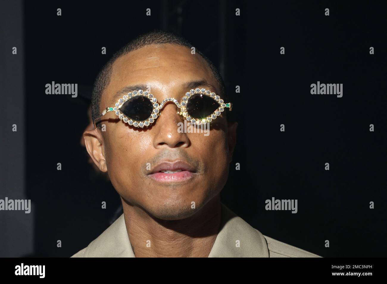 Pharrell Williams arrives for the Off-White Ready To Wear Fall/Winter  2022-2023 fashion collection, unveiled during the Fashion Week in Paris,  Monday, Feb. 28, 2022. (Photo by Vianney Le Caer/Invision/AP Stock Photo 