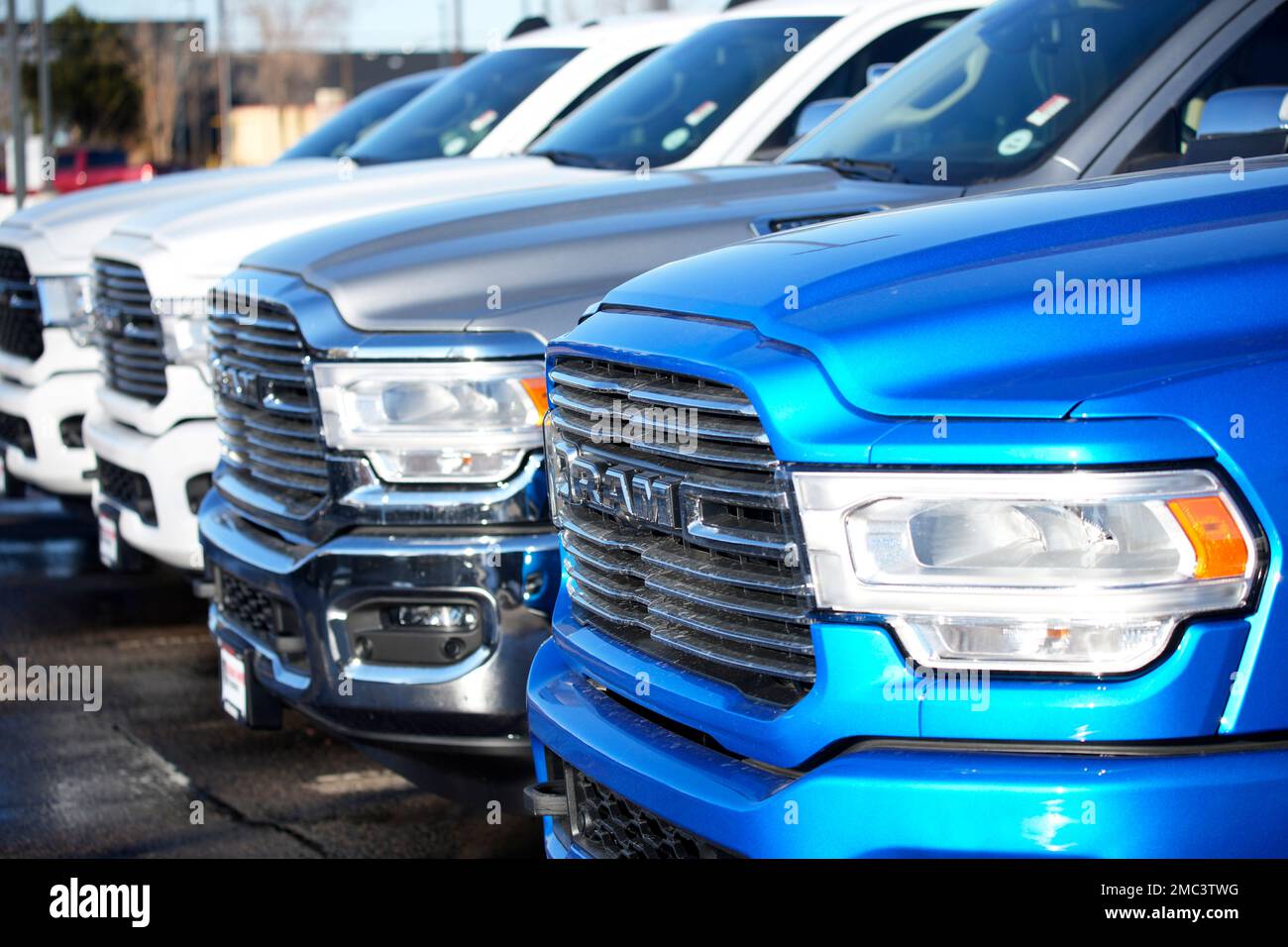 Unsold 2022 Ram pickup trucks sit in short row outside a Dodge dealership  Sunday, Feb. 27, 2022, in Littleton, Colo. (AP Photo/David Zalubowski Stock  Photo - Alamy
