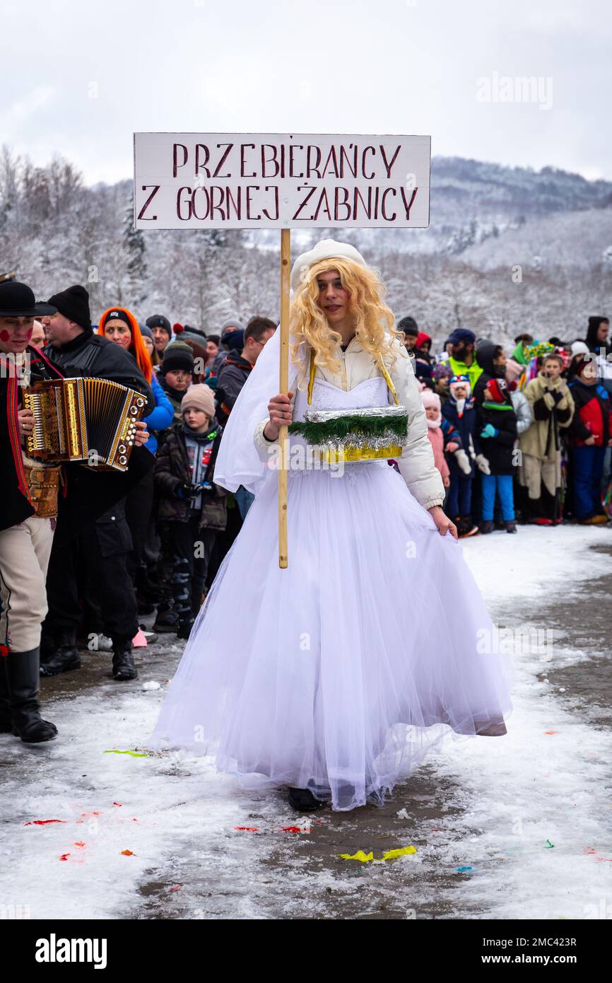 Milowka, Poland. 21st Jan, 2023. Gody Zywieckie - traditional winter parade of 'Dziady', folk custom in Zywiec region, man dressed in traditional costume of bride. Credit: Aleksandra Tokarz/Alamy Live News Stock Photo
