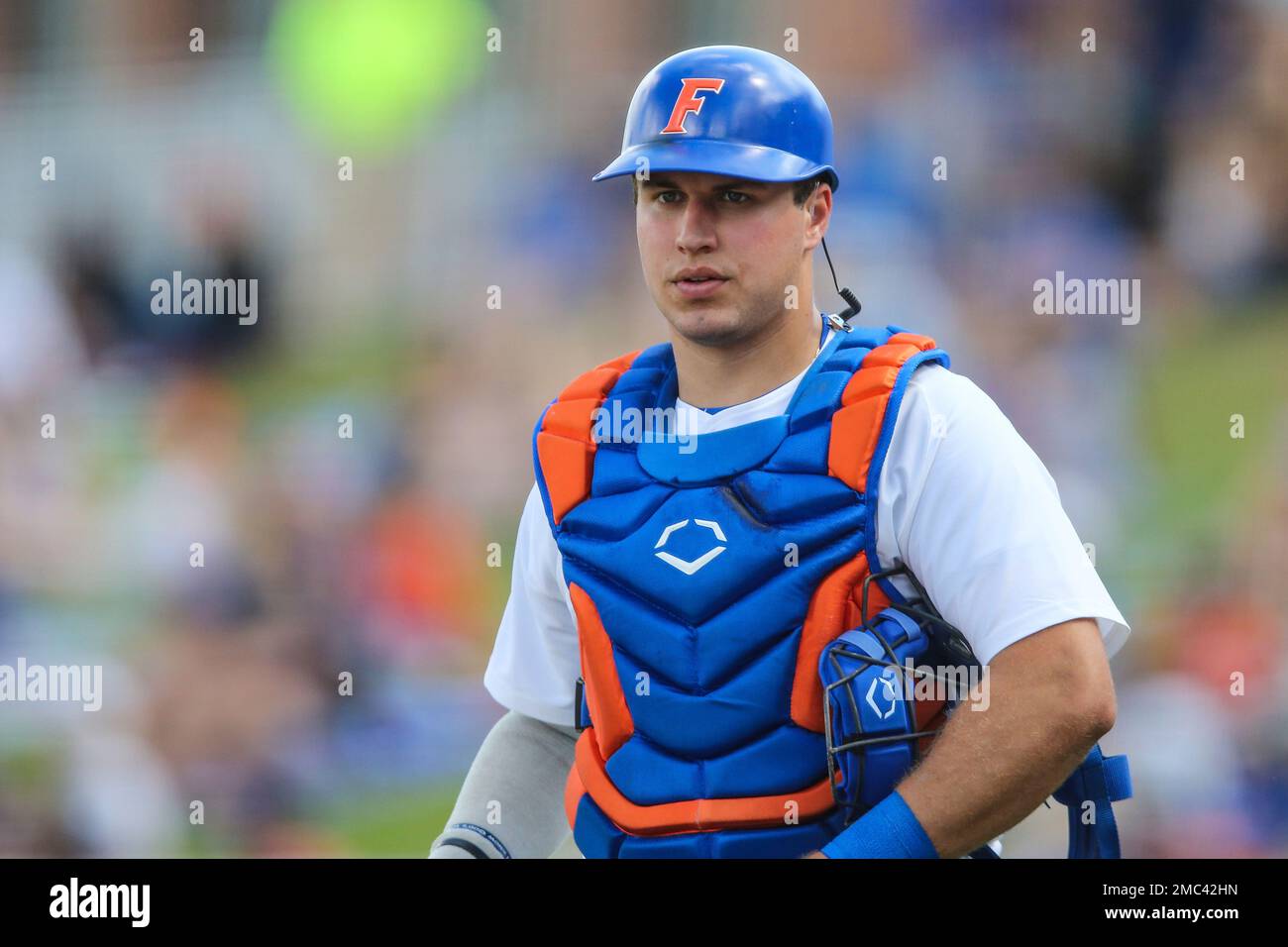 Florida catcher BT Riopelle (15) runs to first base during an NCAA