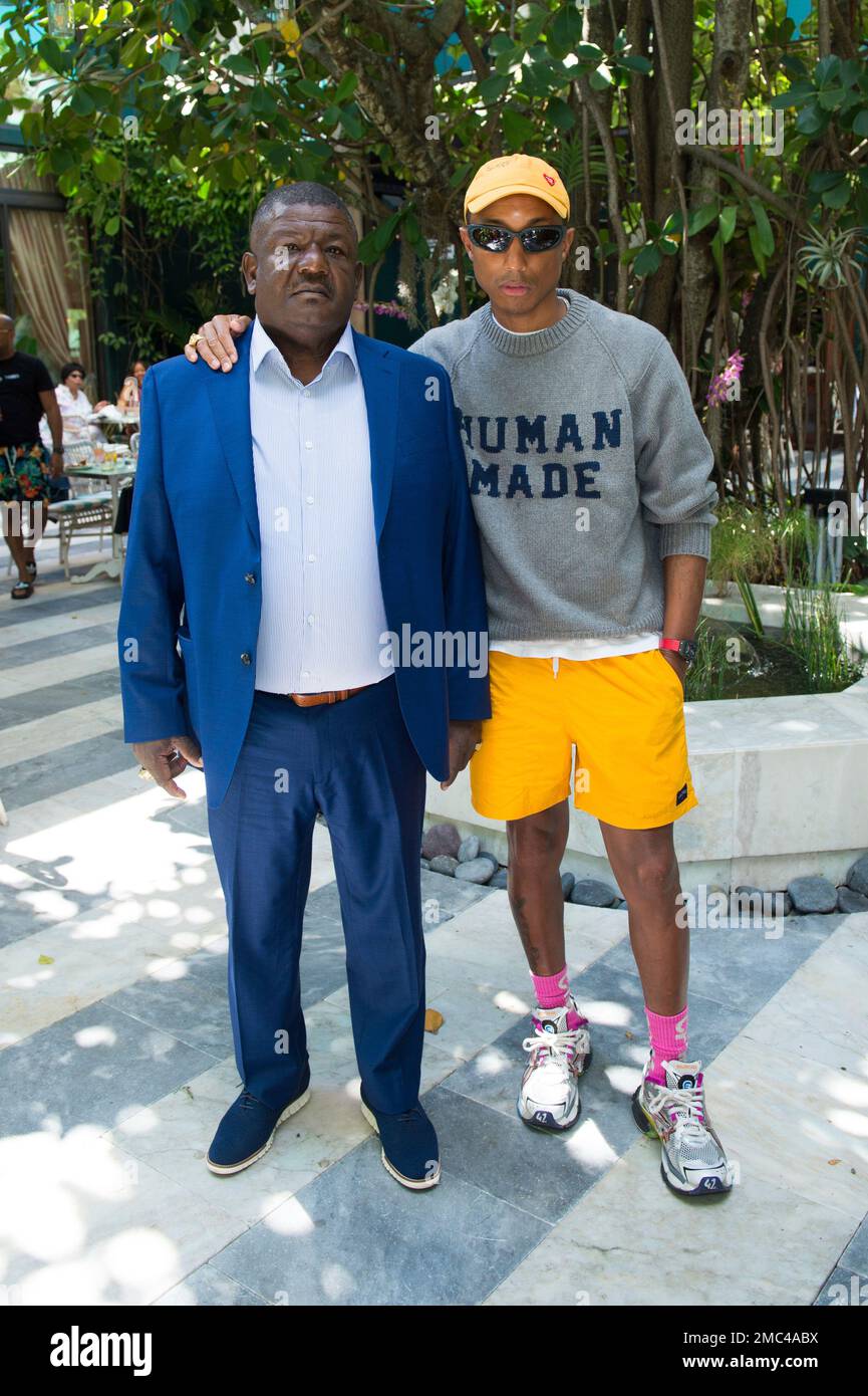 Pharoah Williams left and Pharrell Williams attend Williams