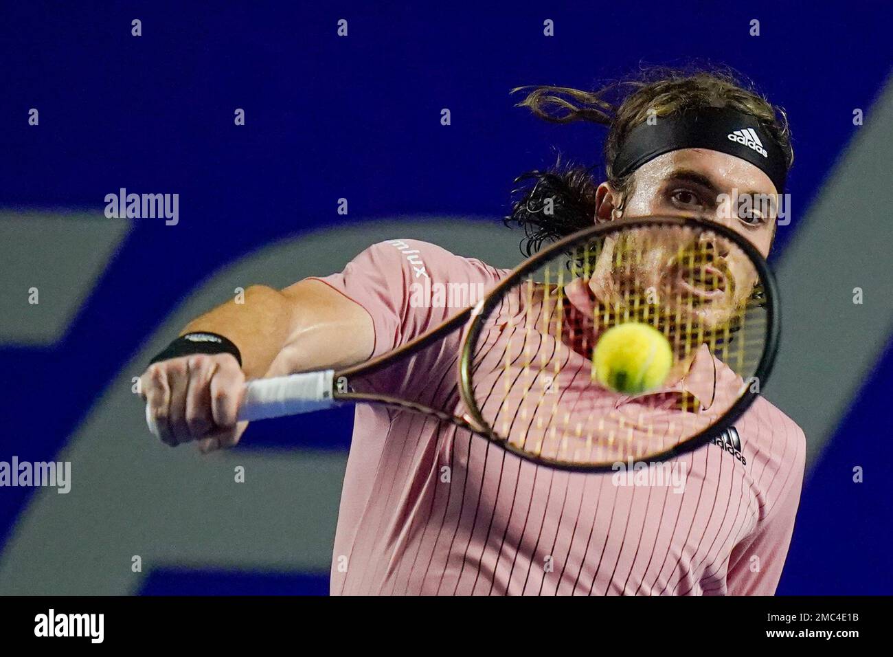 Greeces Stefanos Tsitsipas returns a ball during his semifinal match against Britains Cameron Norrie at the Mexican Open tennis tournament in Acapulco, Mexico, Friday, Feb