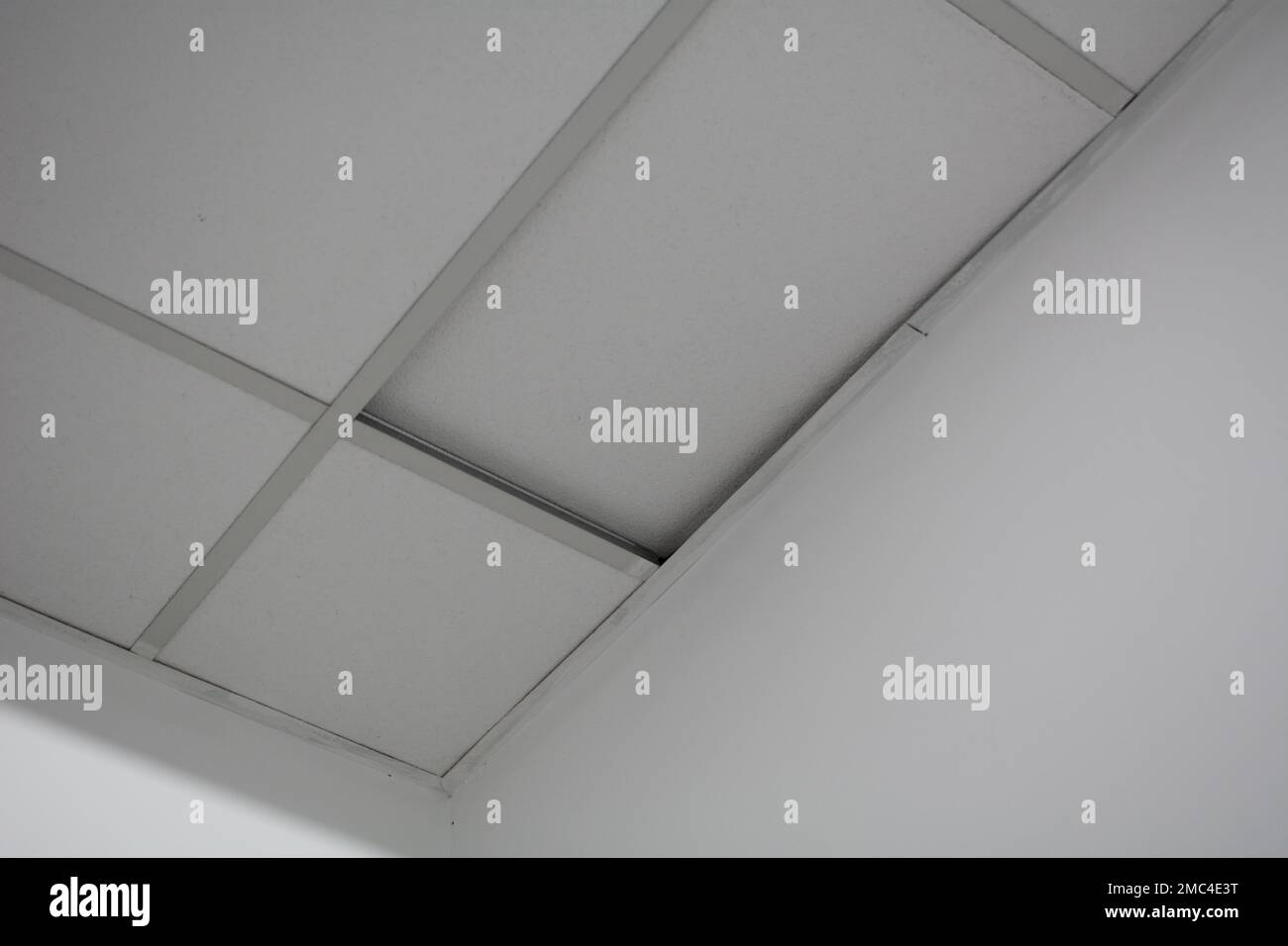 Ceiling tiles peeled off the ceiling. Poor quality damaged pvc ceiling