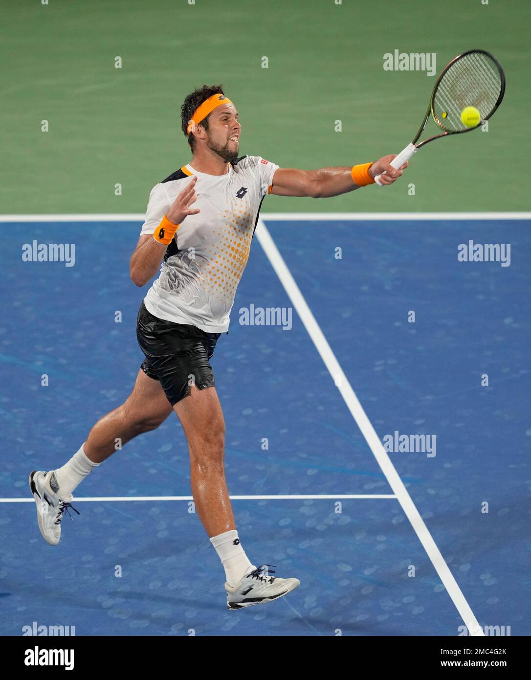 Czech Republic's Jiri Vesely returns the ball to Canada's Denis Shapovalov  during a semifinal match of the Dubai Duty Free Tennis Championship in  Dubai, United Arab Emirates, Friday, Feb. 25, 2022. (AP