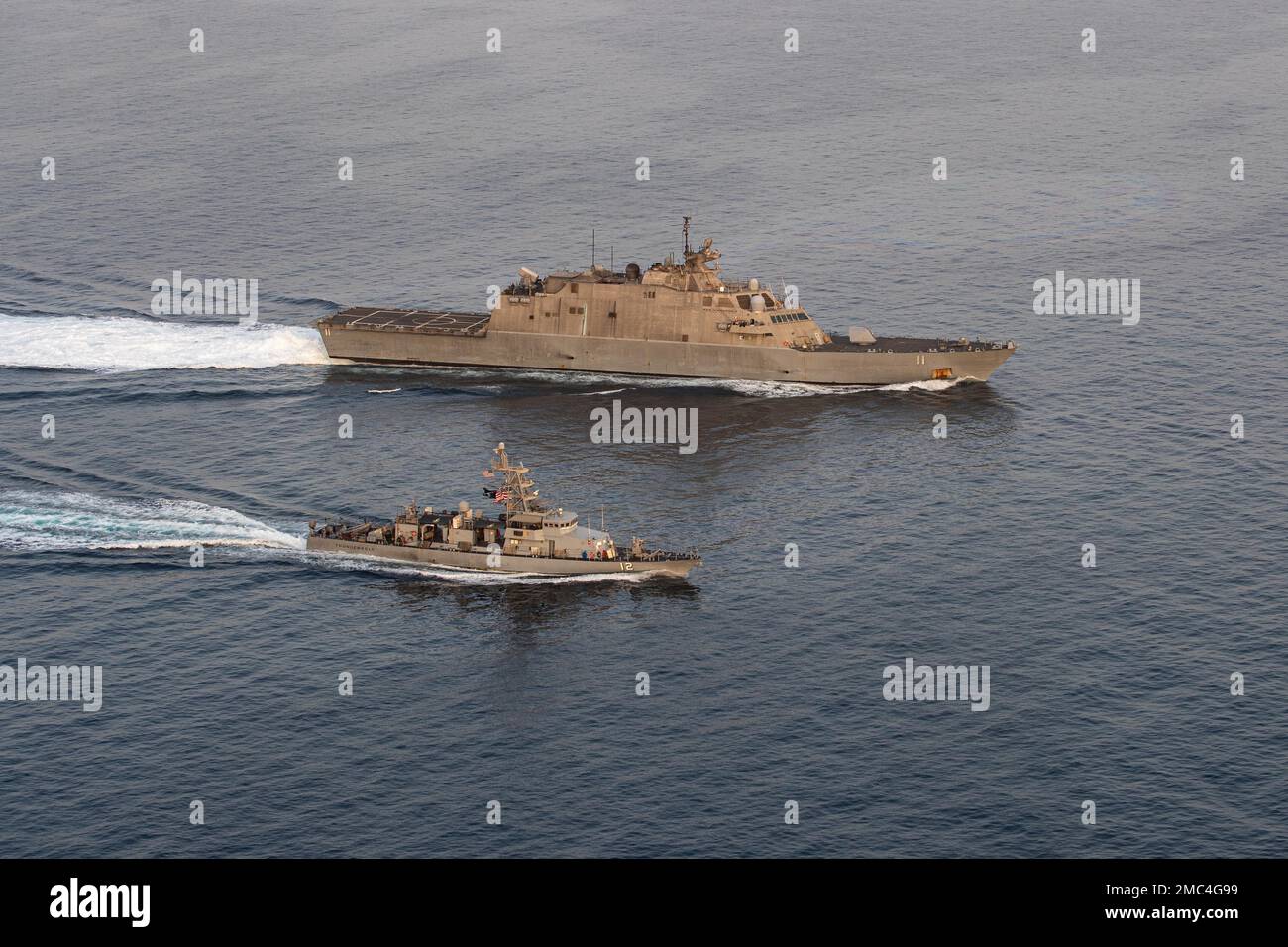 220624-N-NR343-2906 STRAIT OF HORMUZ (June 24, 2022) Littoral combat ship USS Sioux City (LCS 11) and coastal patrol ship USS Thunderbolt (PC 12) transit the Strait of Hormuz, June 24. Sioux City is deployed to the U.S. 5th Fleet area of operations to help ensure maritime security and stability in the Middle East region. Stock Photo