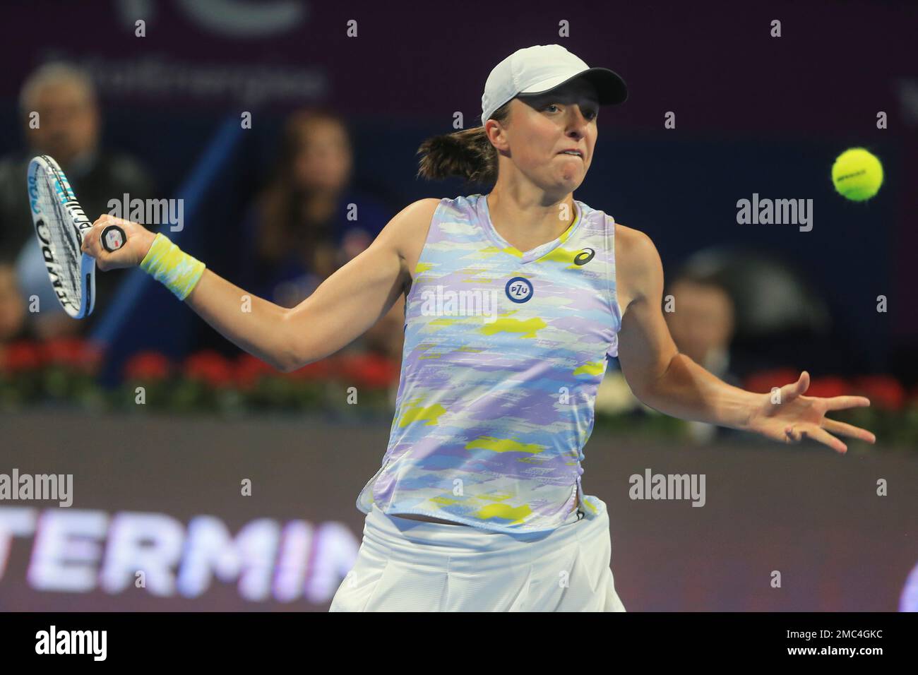 Iga Swiatek of Poland returns during a semi-final match against Maria Sakkari at Qatar Open WTA tennis tournament in Doha, Qatar, Friday, Feb