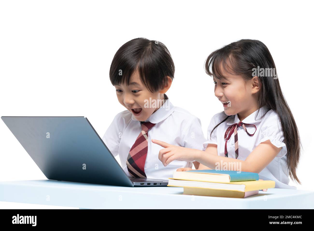 The little boy and little girl in the study Stock Photo - Alamy