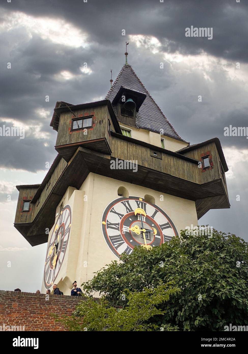 Iconic historic clock tower in the city center of Graz, Austria Stock ...