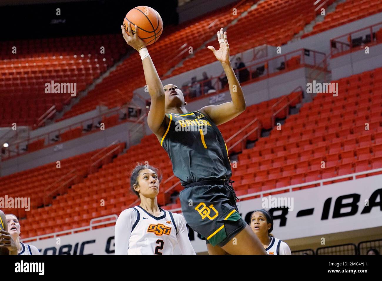 Baylor forward NaLyssa Smith (1) shoots in front of Oklahoma State