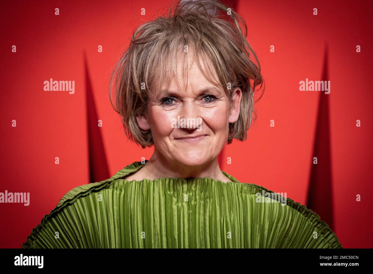 Lorraine Ashbourne poses for photographers upon arrival for the