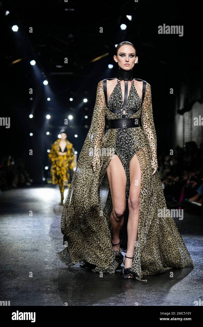 A model wears a creation as part of the Roberto Cavalli Fall Winter 2022 2023 fashion collection unveiled during the Fashion Week in Milan Italy Wednesday Feb. 23 2022. AP Photo Antonio Calanni Stock ...