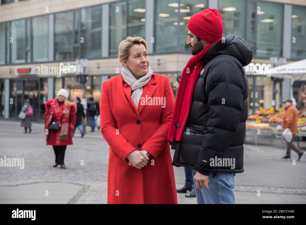 On January 21, 2023, the Governing Mayor of Berlin, Franziska Giffey, paid a visit to an election booth of the SPD (Social Democratic Party of Germany) in the city. The visit was part of the ongoing campaign for the 2023 Berlin repeat state election. Giffey, also an SPD member, took advantage of speaking with party members and supporters operating the booth. She also took the opportunity to meet with residents and listen to their concerns. She emphasized the importance of the SPD's commitment to social justice and fair economic policies, as well as its commitment to working toward a more susta Stock Photo