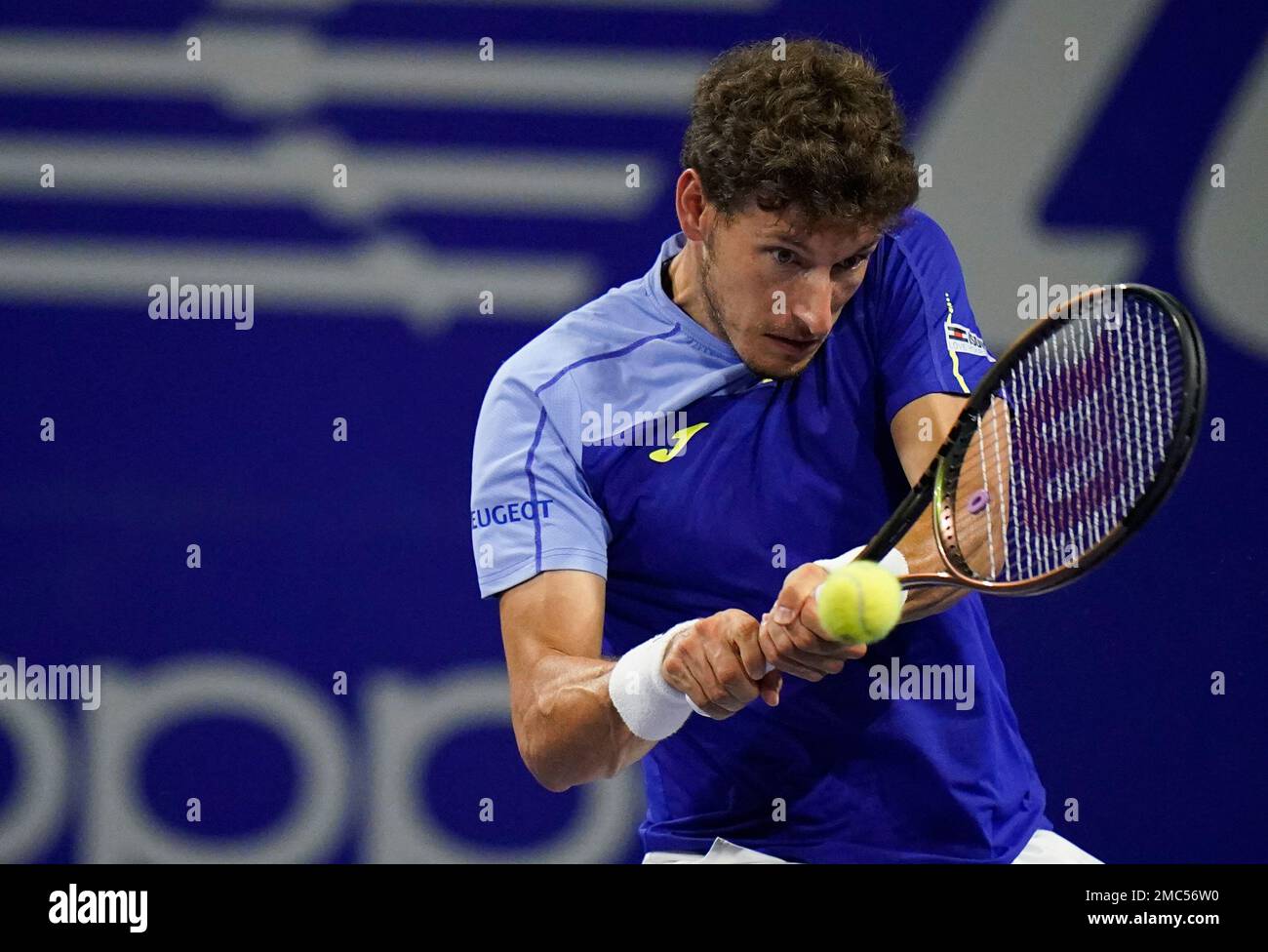 Pablo Carreno Busta, of Spain, returns a ball to Oscar Otte, of Germany, during their match at the Mexican Open tennis tournament in Acapulco, Mexico, Monday, Feb