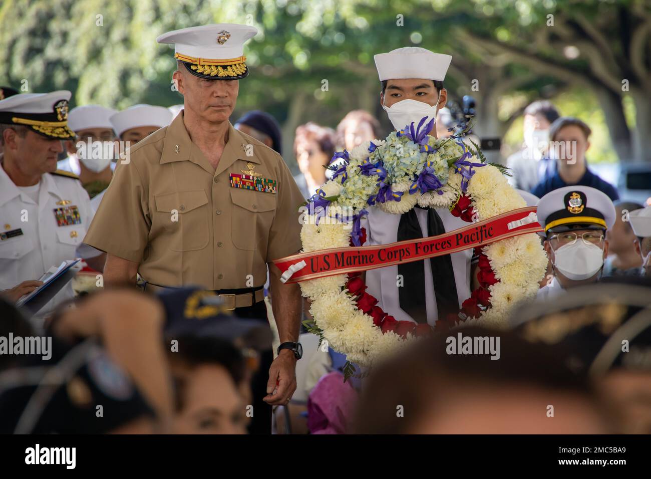 U.S. Marine Corps Maj. Gen. Mark Hashimoto, executive director, U.S. Marine Corps Forces, Pacific, lays a wreath during the 72nd Korean War Anniversary at the National Memorial Cemetery of the Pacific (Punchbowl) in Honolulu, Hawaii, June 25, 2022. The Korean War began on June 25, 1950, when North Korean armed forces invaded South Korea. The attack took place at several strategic points along the 38th parallel, the line dividing the communist Democratic People’s Republic of Korea from the Republic of Korea in the south. This event honors the lives lost and the sacrifices made during the war. Stock Photo