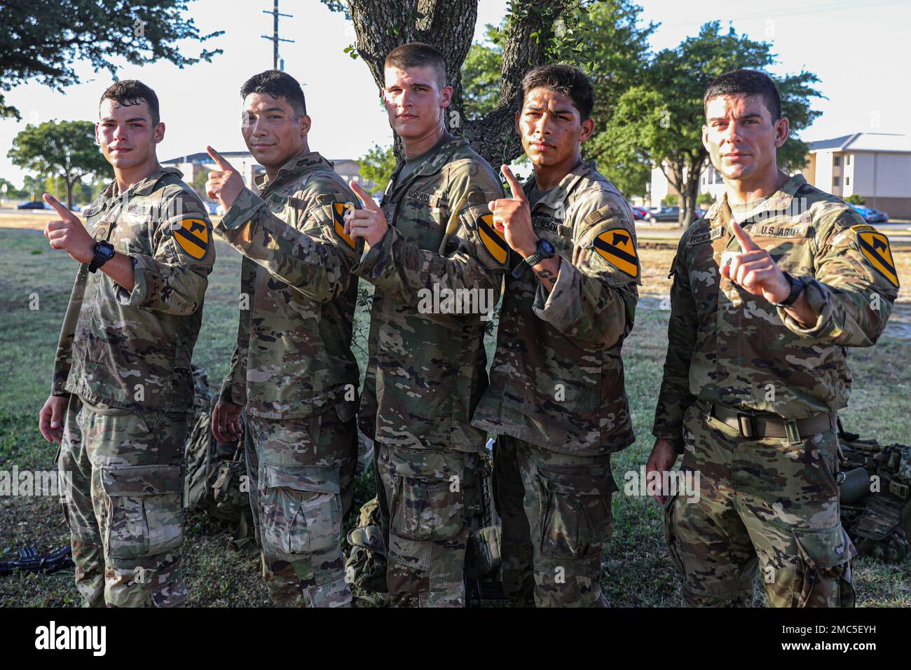 U.S. Army Soldiers assigned to the 2nd Battalion, 7th Cavalry Regiment, 1st Cavalry division, pose for a group photo after finishing first in the ruck march during the III Armored Corps Best Squad Competition June 25, 2022. The III Armored Corps pulled only the best from across its divisions and separate brigades to compete in this year’s inaugural competition. The best Squad goes on to compete at the U.S. Army Forces Command competition at Fort Hood in August. Stock Photo