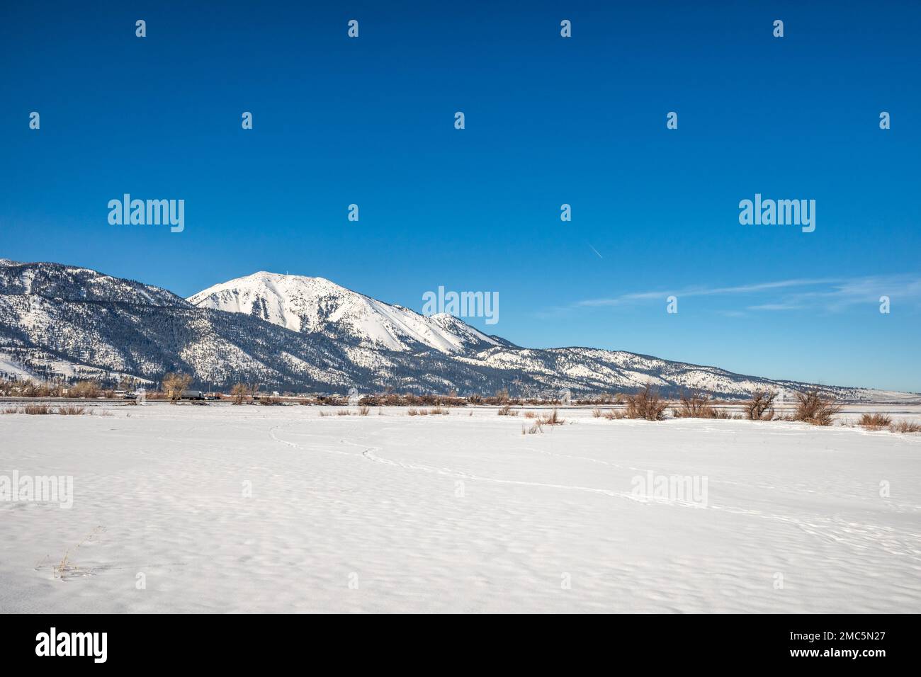 Snow covered frozen landscape with Mt Rose and Slide Mountain, in Washoe Valley between Reno and Carson City Nevada. Stock Photo