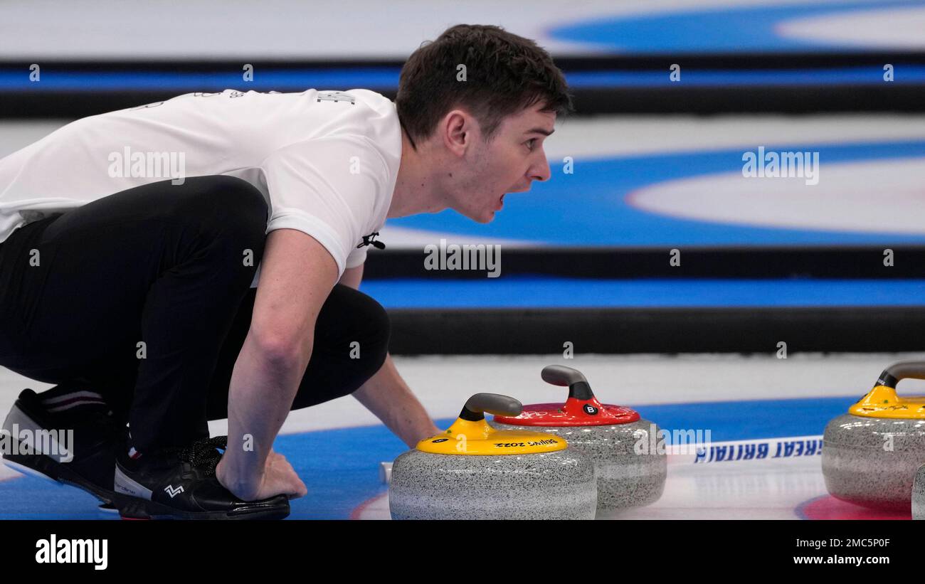 Britains Grant Hardie competes during the mens curling final match between Britain and Sweden at the Beijing Winter Olympics Saturday, Feb