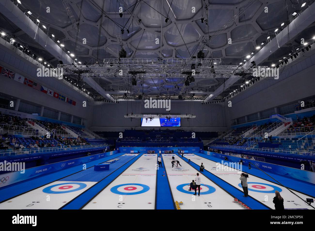 Sweden and Britain compete in the mens curling final match at the Beijing Winter Olympics Saturday, Feb