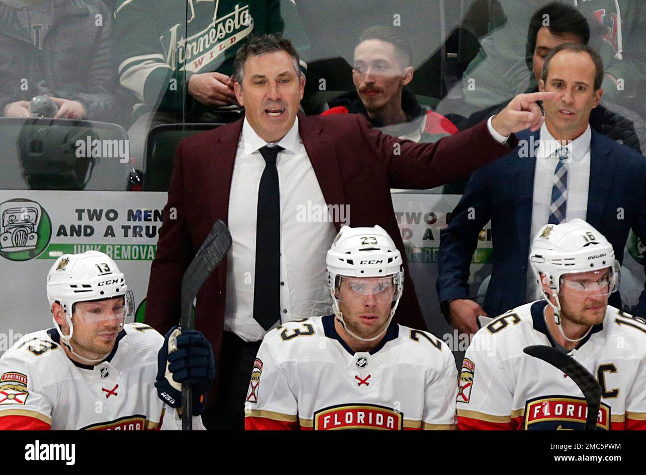 Florida Panthers coach Andrew Burnett yells during the third period of the team's NHL hockey game against the Minnesota Wild on Friday, Feb. 18, 2022, in St. Paul, Minn. (AP Photo/Andy Clayton-King Florida Panthers coach Andrew Burnett yells during the third period of the team's NHL hockey game against the Minnesota Wild on Friday, Feb. 18, 2022, in St. Paul, Minn. (AP Photo/Andy Clayton-King