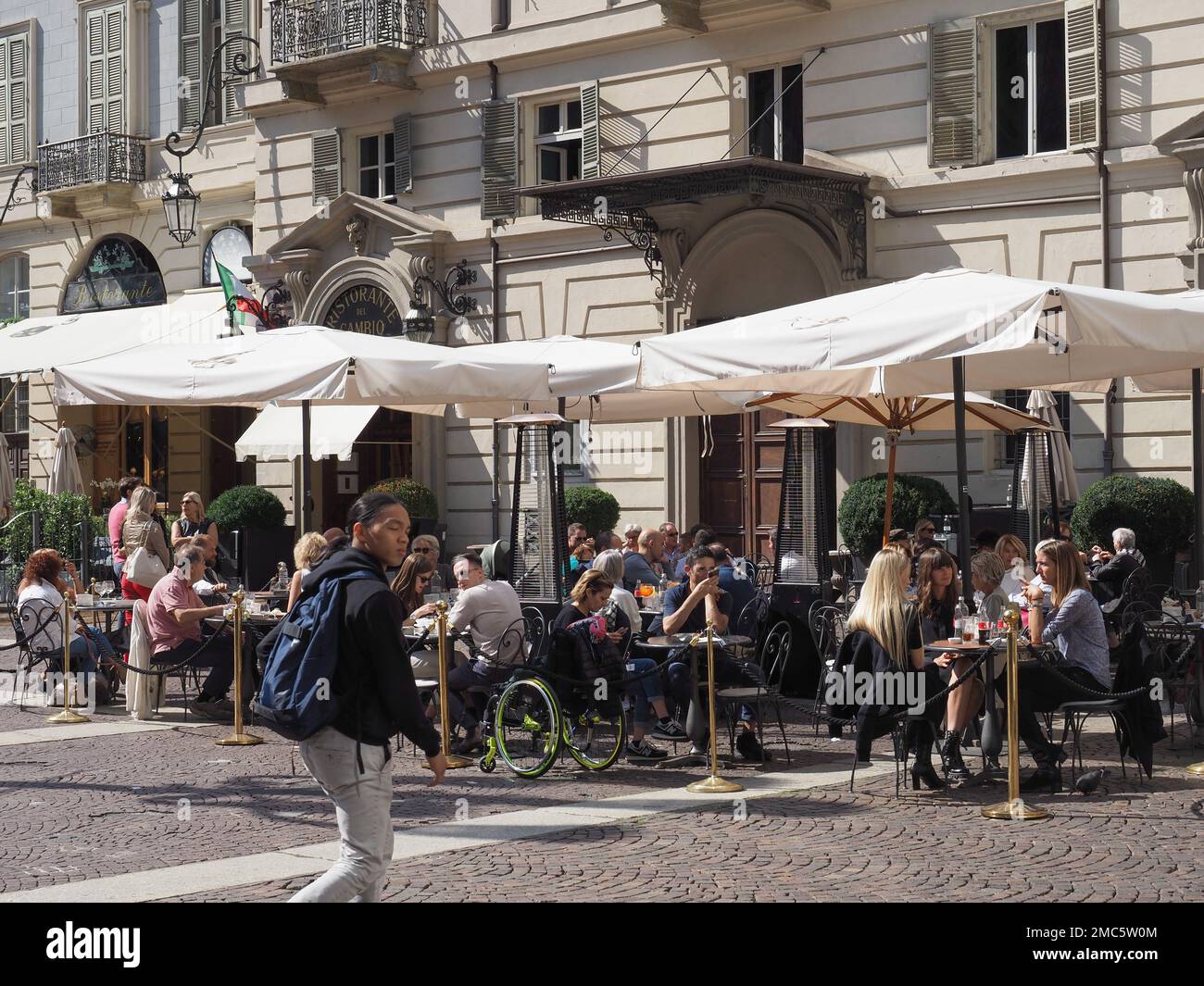 TURIN, ITALY - CIRCA SEPTEMBER 2022: People at Ristorante del Cambio restaurant Stock Photo