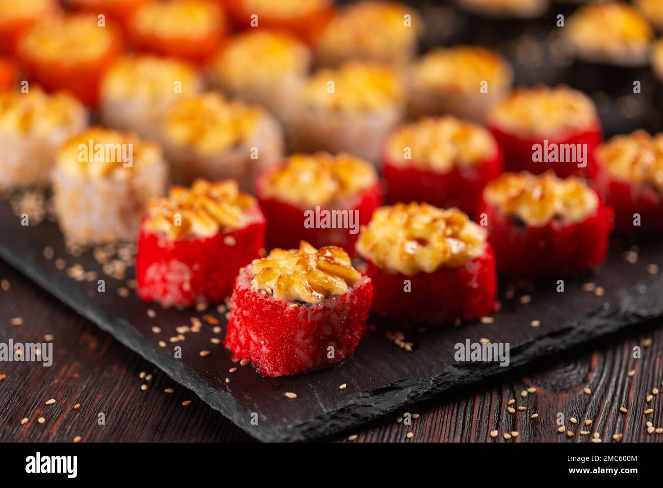 Japanese salmon sushi with spicy mayonnaise and tobiko caviar Sushi