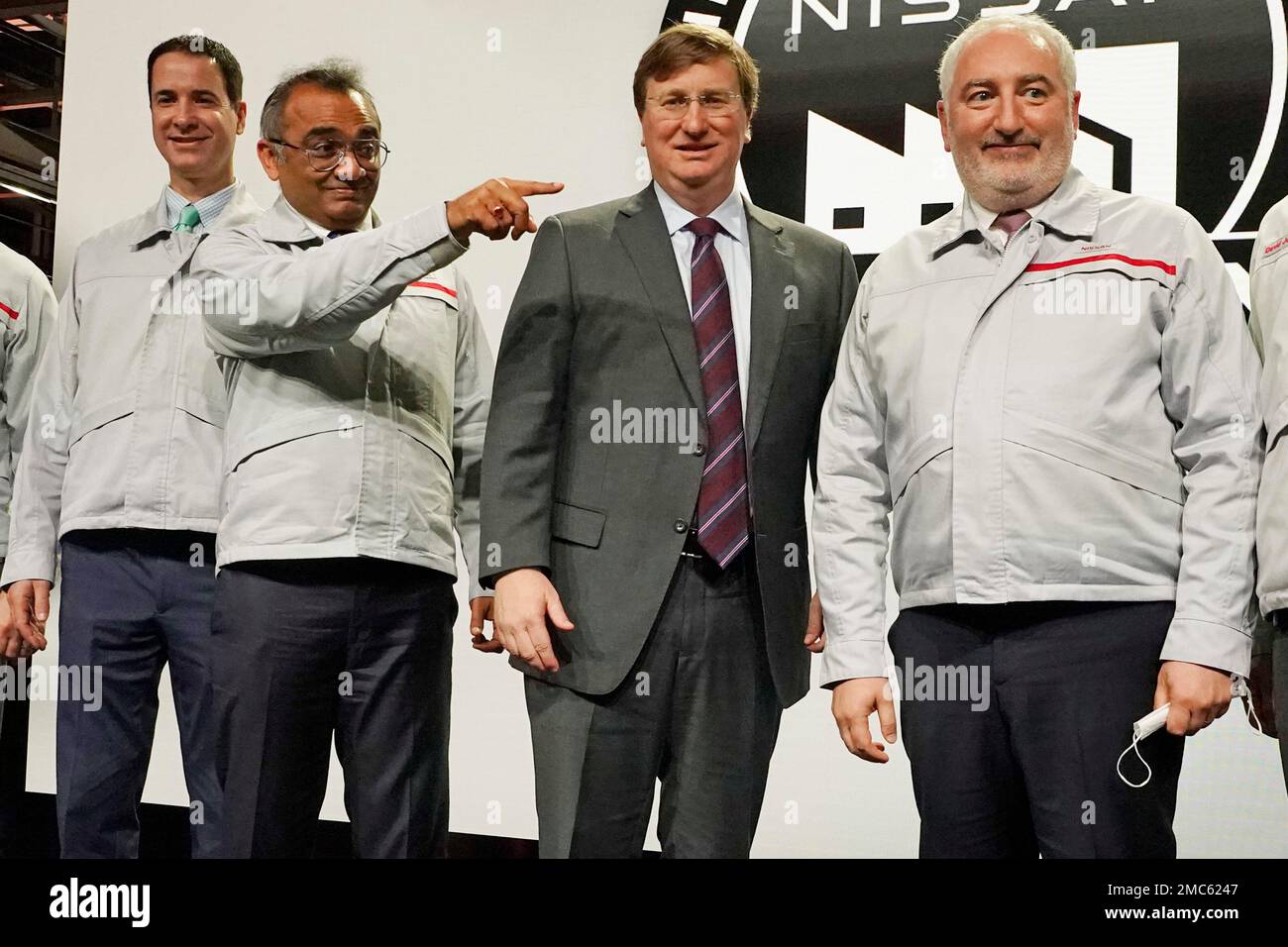 Ashwani Gupta, chief operation officer, gestures, second from left, as