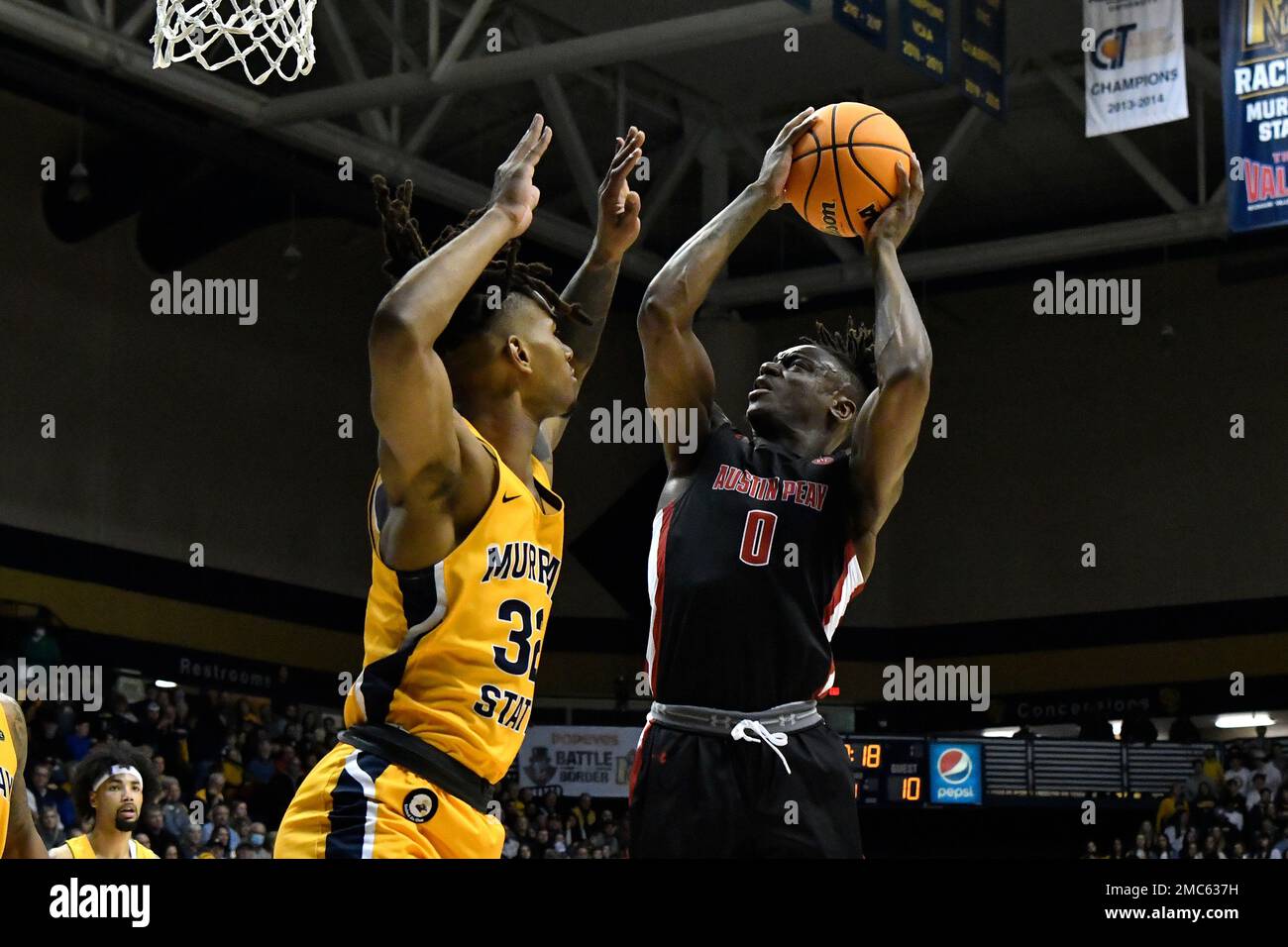 Austin Peay forward Elton Walker (0) shoots over Murray State forward