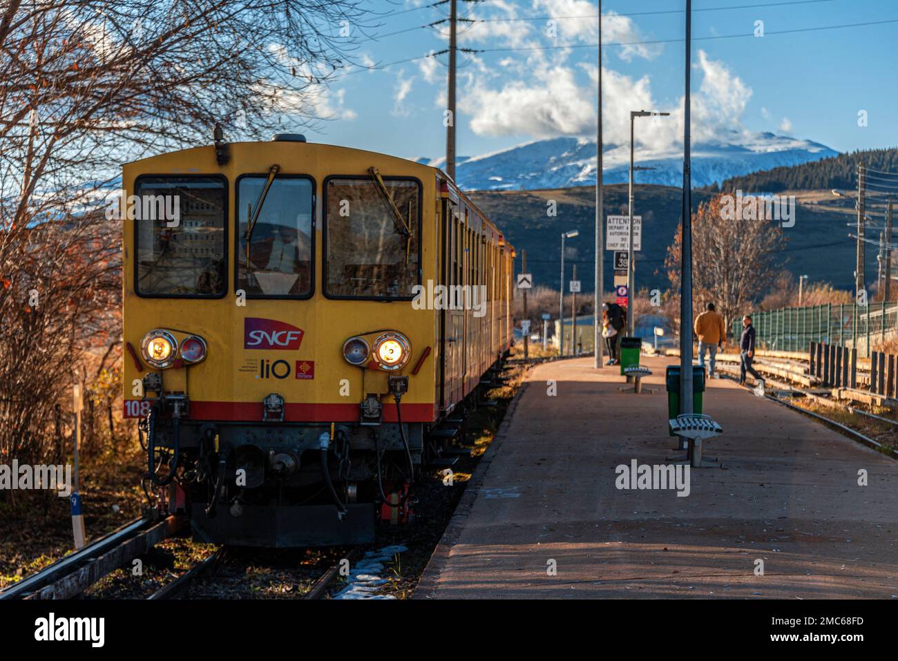 The Yellow train 'Le Train Jaune', here at Font Romeu, in the Pyrenees Orientales region of southern France. Stock Photo